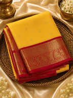 Classic Yellow Kanchipuram Silk Saree with Rich Red Korvai Border