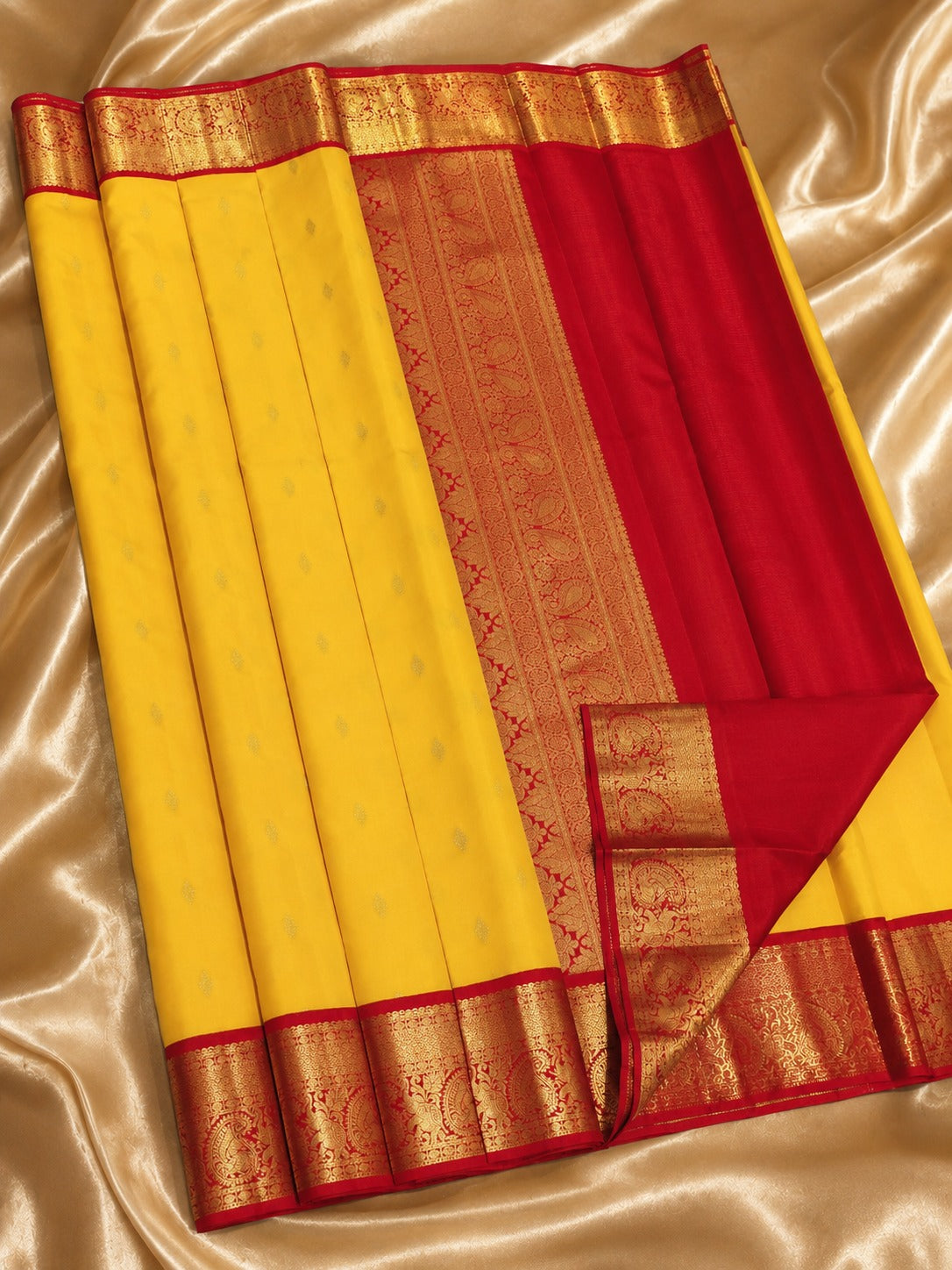 Classic Yellow Kanchipuram Silk Saree with Rich Red Korvai Border