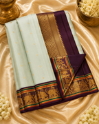Elegant Mint Green Pure Kanchipuram Silk Saree with Traditional Korvai Border